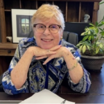 Anne at desk